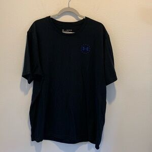Under Armour Mens Black with Blue&Gray Graphic Freedom Tee. Size 3XL. Chest 52”.